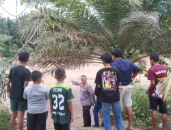 Wujudkan Cooling System Jelang Pemilu Damai 2024, Kapolsek XIII Koto Kampar Patroli dan Pantau Lokasi Rawan Bencana