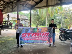 Antisipasi Karhutla, Polsek Muara Wis Pasang Himbauan Larangan Membakar Hutan di Desa Lebak Cilong