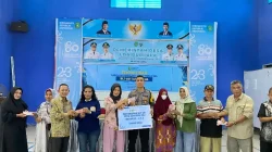 Kawal Penyaluran BLT, Bhabinkamtibmas Polsek Loa Janan Perkuat Sinergi dan Pesan Kamtibmas di Desa Binaan